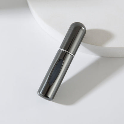Bottom-fill perfume refill bottle with self-pump sprayer