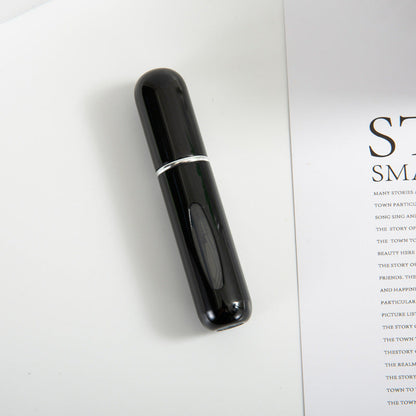 Bottom-fill perfume refill bottle with self-pump sprayer